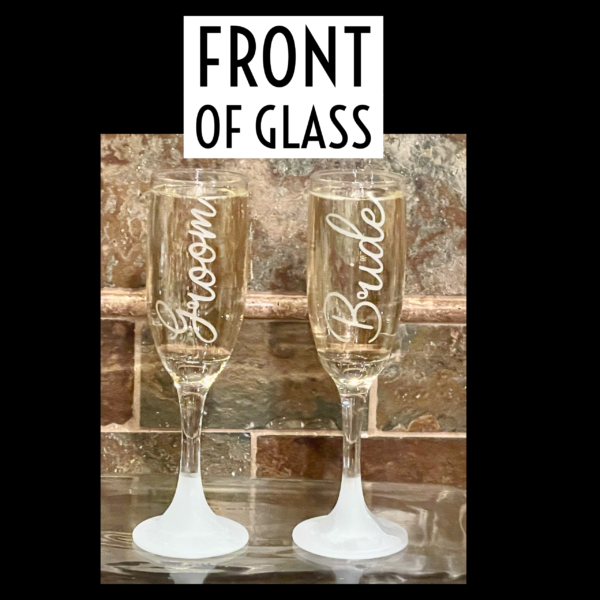 Front of Bride & Groom Champagne Flutes with sand blasted base by Colorado Custom Decor.