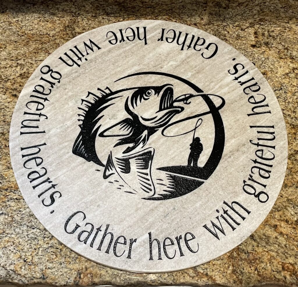 SPECIAL ORDER FISHING LAZY SUSAN WITH QUOTE ON OUTSIDE.