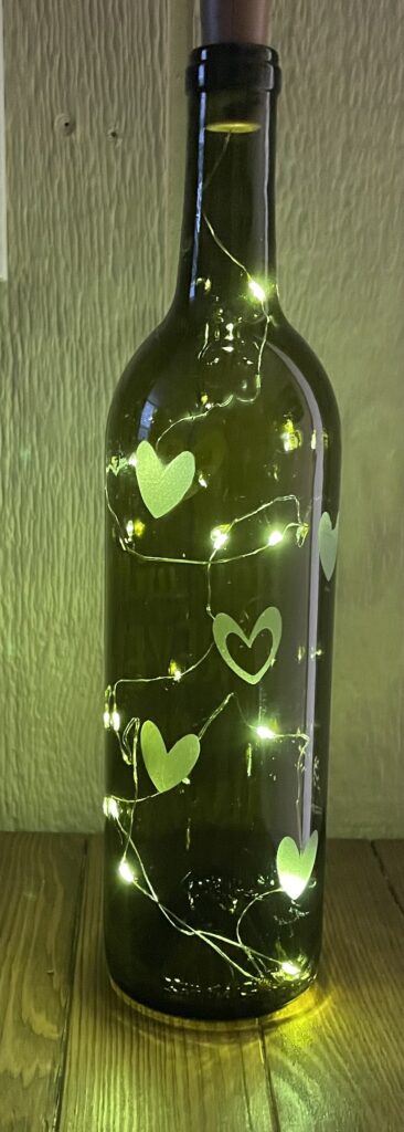 SAND BLASTED WITH LIGHTED CORK WINE BOTTLES