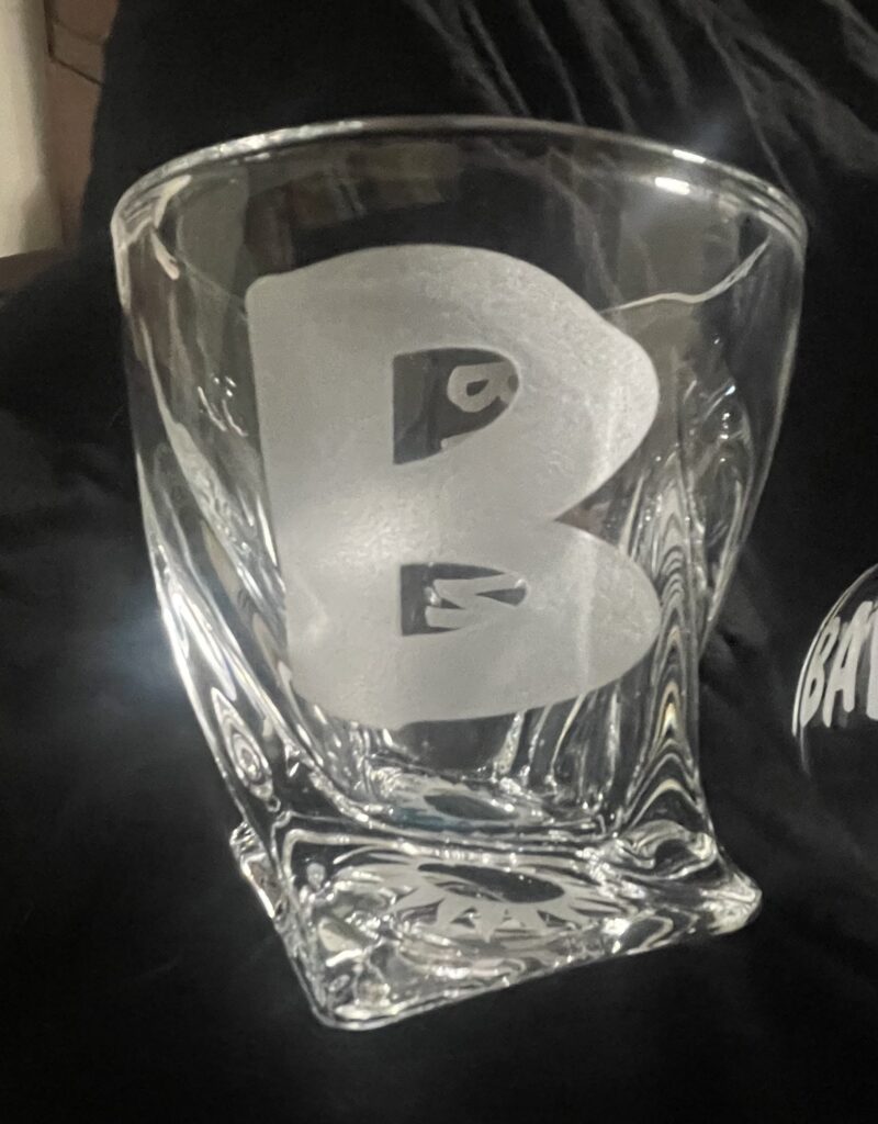 SPECIAL ORDER LAST NAME INITIAL ON TWISTED ROCKS GLASS.